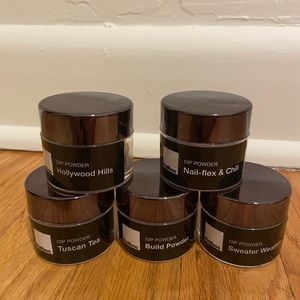 Nailboo dip powder colors and build powder.